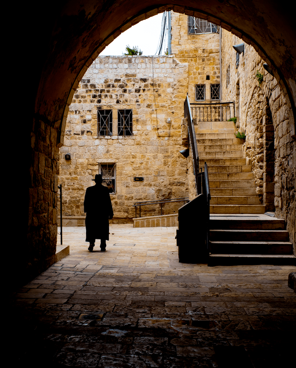 The Walls We Build and the Bridges We Cross: Finding Meaning in Stone and Spirit